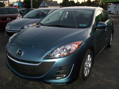 Gunmetal Blue Mica Mazda MAZDA3 i Touring 4 Door. Click to enlarge. Gunmetal Blue Mica Mazda MAZDA3 i Touring 4 Door. Click to enlarge.