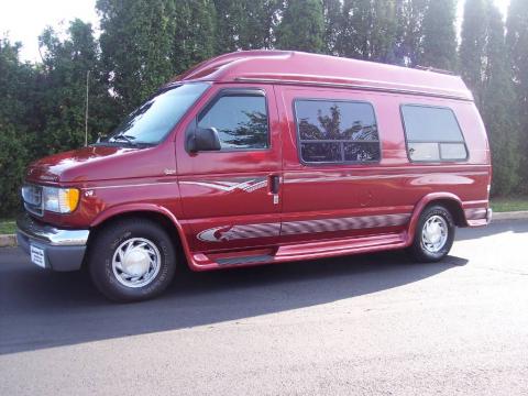 Toreador Red Metallic Ford E Series Van E150 Passenger Conversion.  Click to enlarge.