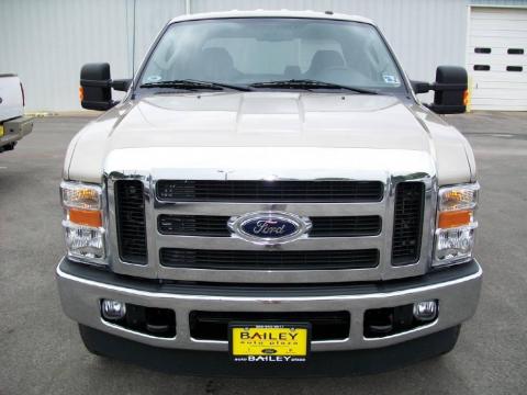 Pueblo Gold Metallic Ford F250 Super Duty XLT FX4 Crew Cab 4x4.  Click to enlarge.