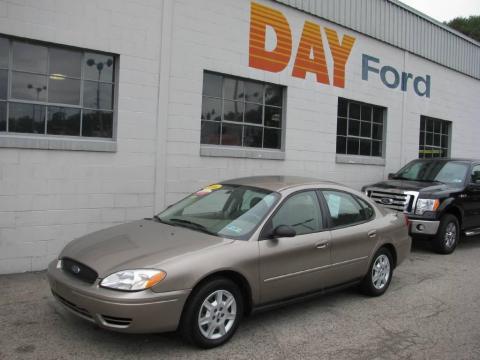 Arizona Beige Metallic Ford Taurus SE.  Click to enlarge.