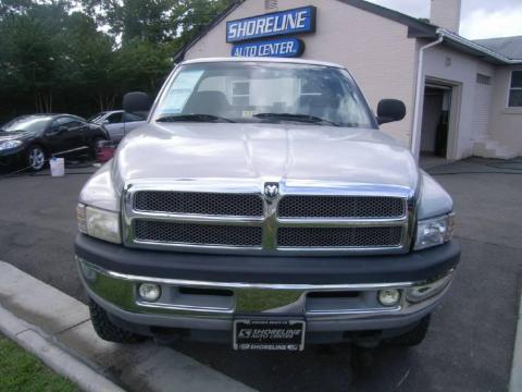 Bright Silver Metallic Dodge Ram 1500 SLT Club Cab 4x4.  Click to enlarge.