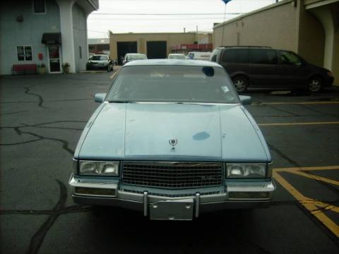 Light Sapphire Blue Metallic Cadillac DeVille Sedan.  Click to enlarge.