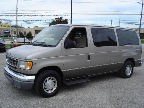 Light Parchment Gold Metallic Ford E Series Van E150 Passenger Traveler.  Click to enlarge.