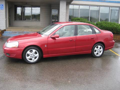 Medium Red Saturn L Series L200 Sedan.  Click to enlarge.