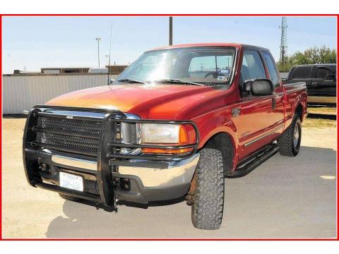 Bright Amber Metallic Ford F250 Super Duty XLT Extended Cab 4x4.  Click to enlarge.