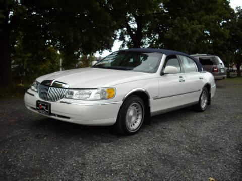 Vibrant White Lincoln Town Car Presidential.  Click to enlarge.