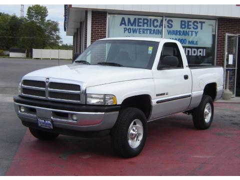 Bright White Dodge Ram 1500 SLT Regular Cab 4x4.  Click to enlarge.