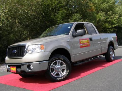 Pueblo Gold Metallic Ford F150 XLT SuperCab 4x4.  Click to enlarge.