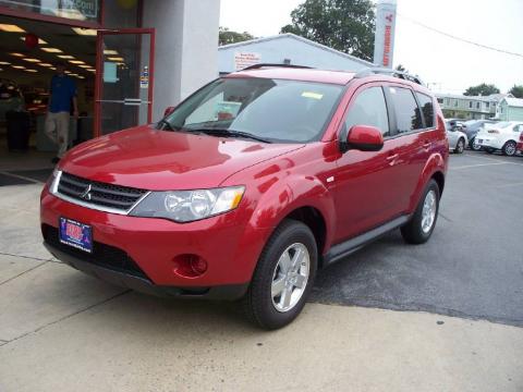 Rally Red Metallic Mitsubishi Outlander ES 4WD.  Click to enlarge.