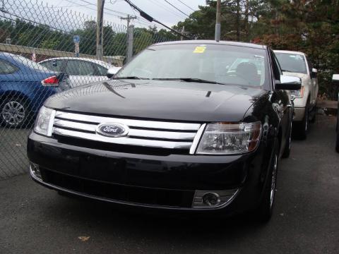Tuxedo Black Metallic Ford Taurus Limited.  Click to enlarge.