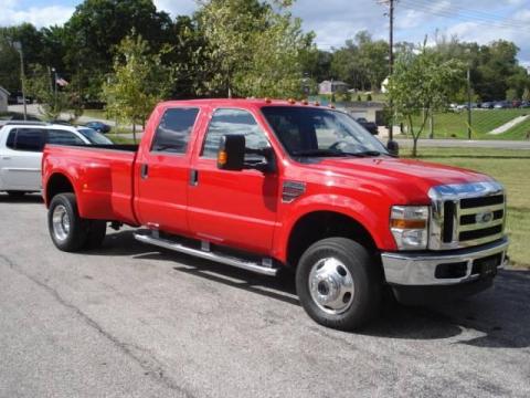 Bright Red Ford F350 Super Duty XLT Crew Cab 4x4 Dually.  Click to enlarge.