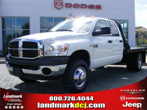 Bright White Dodge Ram 3500 SLT Quad Cab 4x4 Dually.  Click to enlarge.