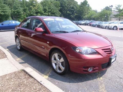 Copper Red Mica Mazda MAZDA3 s Grand Touring Sedan.  Click to enlarge.