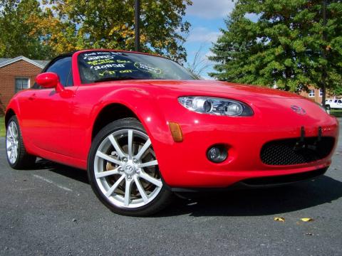 True Red Mazda MX-5 Miata Touring Roadster.  Click to enlarge.