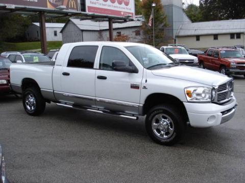 Bright White Dodge Ram 3500 Laramie Mega Cab 4x4.  Click to enlarge.