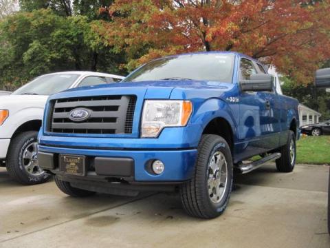 Blue Flame Metallic Ford F150 STX SuperCab 4x4.  Click to enlarge.