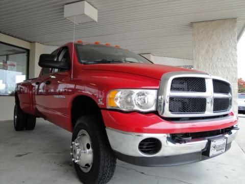 Flame Red Dodge Ram 3500 SLT Quad Cab 4x4 Dually.  Click to enlarge.