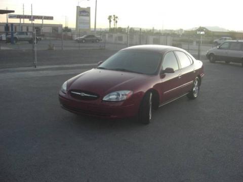 Matador Red Metallic Ford Taurus SES.  Click to enlarge.