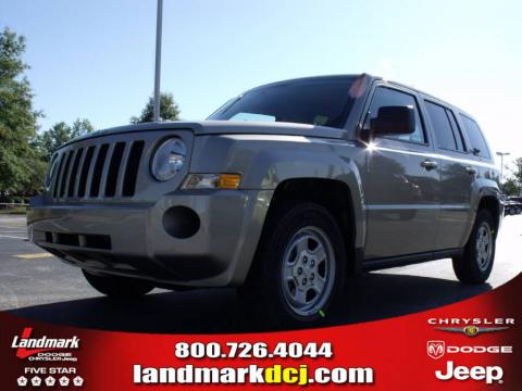 Light Sandstone Metallic Jeep Patriot Sport.  Click to enlarge.