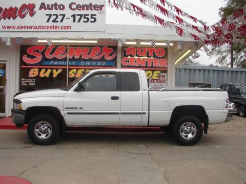 Bright White Dodge Ram 1500 SLT Extended Cab 4x4.  Click to enlarge.
