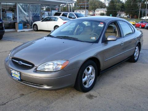 Arizona Beige Metallic Ford Taurus SES.  Click to enlarge.