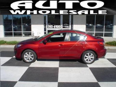 Copper Red Mica Mazda MAZDA3 i Touring 4 Door.  Click to enlarge.