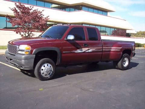 Dark Toreador Red Metallic GMC Sierra 3500 SLT Extended Cab 4x4 Dually.  Click to enlarge.