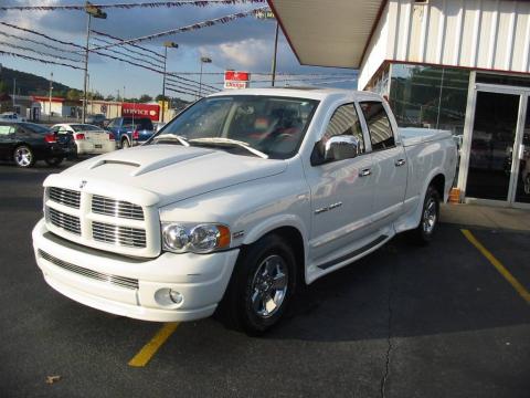 Bright White Dodge Ram 1500 Laramie Quad Cab.  Click to enlarge.