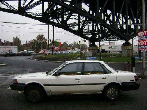 Super White Toyota Camry Deluxe Sedan. Click to enlarge. Super White Toyota Camry Deluxe Sedan. Click to enlarge.