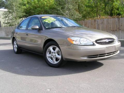 Arizona Beige Metallic Ford Taurus SES.  Click to enlarge.