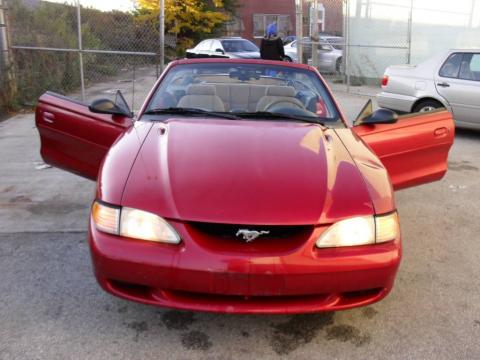 Laser Red Metallic Ford Mustang V6 Convertible.  Click to enlarge.