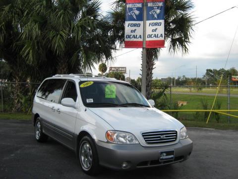 Clear White Kia Sedona EX.  Click to enlarge.