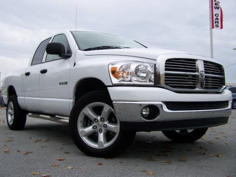 Bright White Dodge Ram 1500 SLT Quad Cab 4x4.  Click to enlarge.
