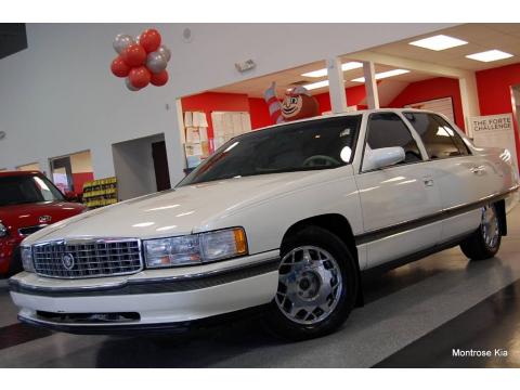 White Cadillac DeVille Sedan.  Click to enlarge.