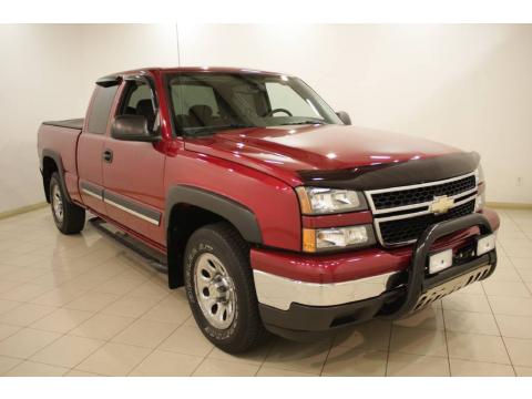 Sport Red Metallic Chevrolet Silverado 1500 LS Extended Cab 4x4.  Click to enlarge.
