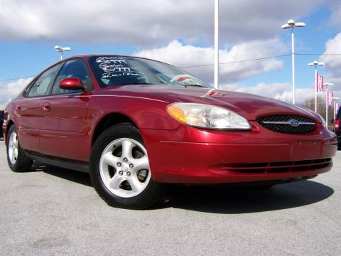 Toreador Red Metallic Ford Taurus SES.  Click to enlarge.