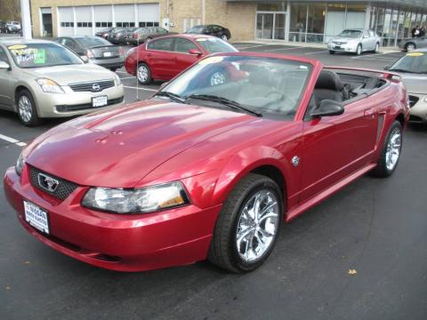 Redfire Metallic Ford Mustang V6 Convertible.  Click to enlarge.