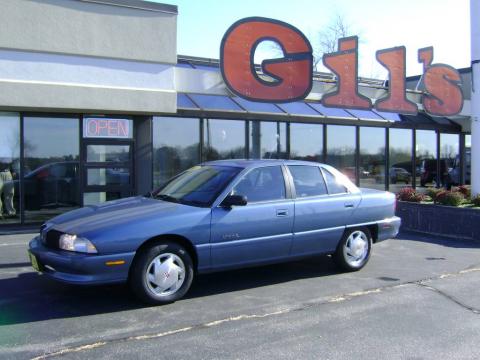 Opal Blue Metallic Oldsmobile Achieva SL Sedan.  Click to enlarge.