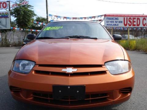 Sunburst Orange Chevrolet Cavalier Coupe.  Click to enlarge.