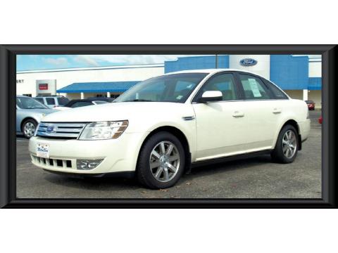 White Suede Ford Taurus SEL.  Click to enlarge.