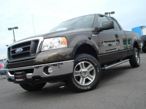 Stone Green Metallic Ford F150 XLT SuperCab 4x4.  Click to enlarge.