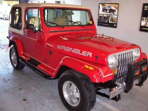 Bright Red Jeep Wrangler Laredo 4x4.  Click to enlarge.