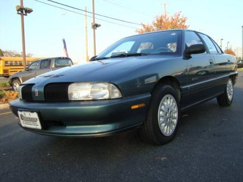 Medium Sea Green Metallic Oldsmobile Achieva SL Sedan.  Click to enlarge.