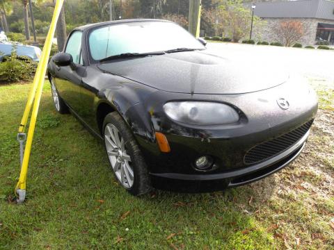 Brilliant Black Mazda MX-5 Miata Grand Touring Roadster.  Click to enlarge.