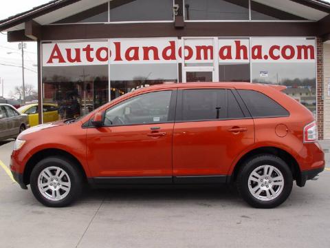 Blazing Copper Metallic Ford Edge SEL AWD.  Click to enlarge.