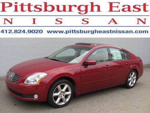 Red Opulence Metallic Nissan Maxima 3.5 SE.  Click to enlarge.