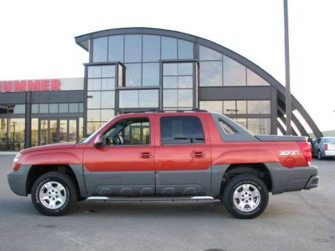 Sunset Orange Metallic Chevrolet Avalanche Z71 4x4.  Click to enlarge.