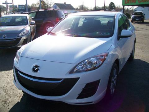 Crystal White Pearl Mica Mazda MAZDA3 i Touring 4 Door.  Click to enlarge.
