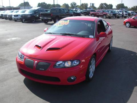 Torrid Red Pontiac GTO Coupe.  Click to enlarge.