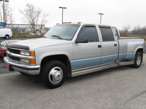 Silver Metallic Chevrolet C/K 3500 C3500 Crew Cab Dually.  Click to enlarge.